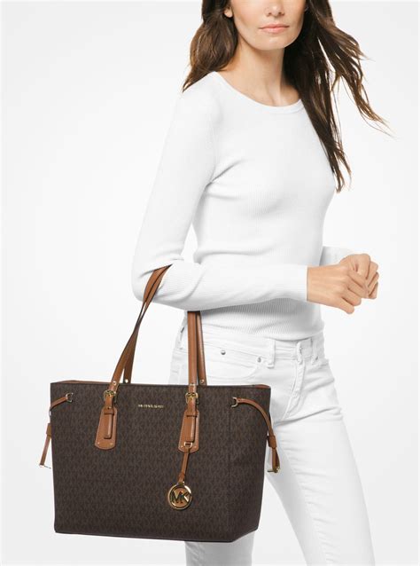 michael michael kors voyager medium logo tote bag|michael kors voyager tote sale.